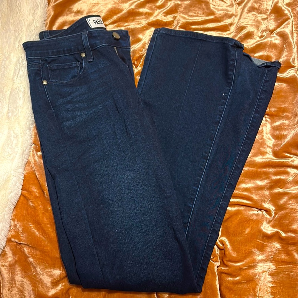 Size 28 Paige denim flared dark blue jeans and mid rise